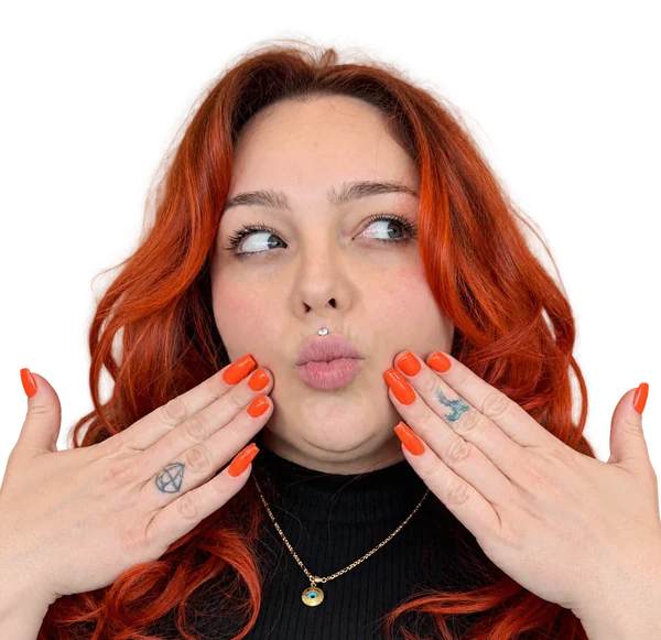 Client with orange hair and nails